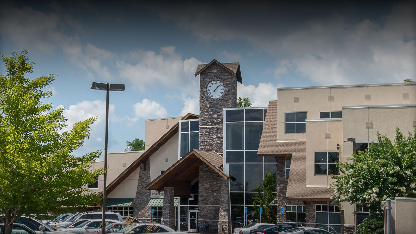 Close Up View of Exterior Clock Tower on Aspen Brook Medical Center, Designed By The Innovations Group